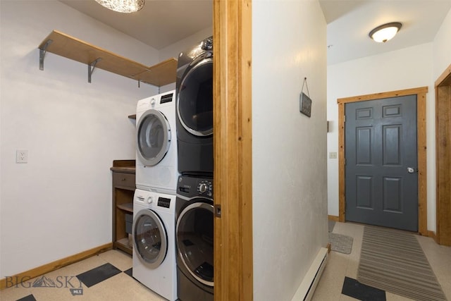 15 Spotted Fawn Ct, Big Sky, MT 59716 - laundry room with stacked washer and clothes dryer, a baseboard radiator, and light flooring