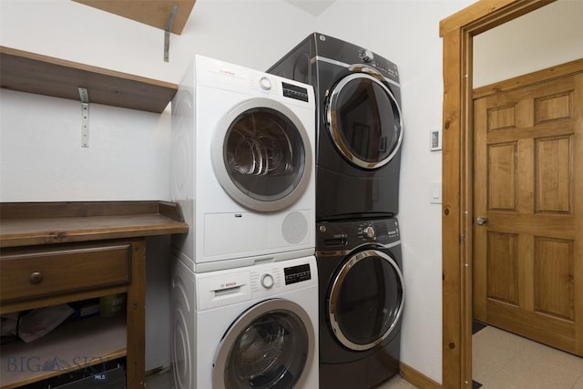 15 Spotted Fawn Ct, Big Sky, MT 59716 - washroom with stacked washing machine and dryer and baseboards