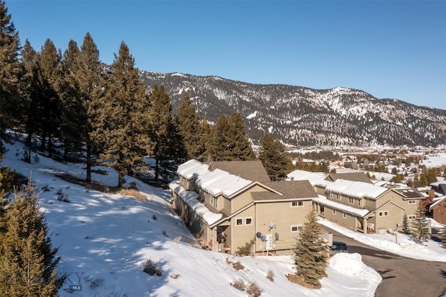 15 Spotted Fawn Ct, Big Sky, MT 59716 - snowy aerial view with a mountain view