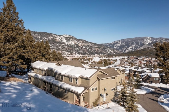 15 Spotted Fawn Ct, Big Sky, MT 59716 - view of mountain backdrop featuring nearby suburban area