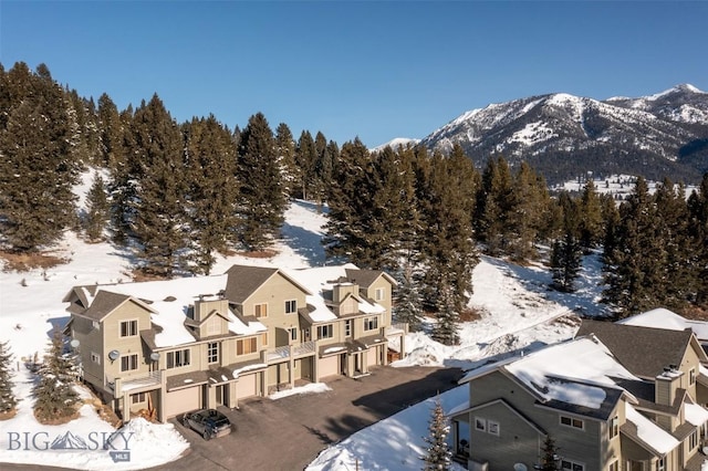 15 Spotted Fawn Ct, Big Sky, MT 59716 - snowy aerial view with a mountain view