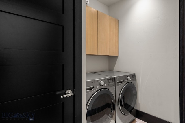 4412 Bembrick St, Bozeman, MT 59718 - laundry area with cabinet space and washer and clothes dryer