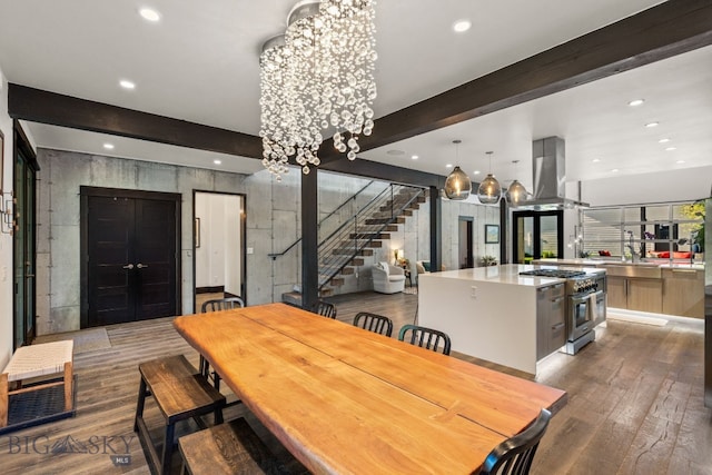 4412 Bembrick St, Bozeman, MT 59718 - dining space with stairs, a chandelier, recessed lighting, wood finished floors, and beam ceiling