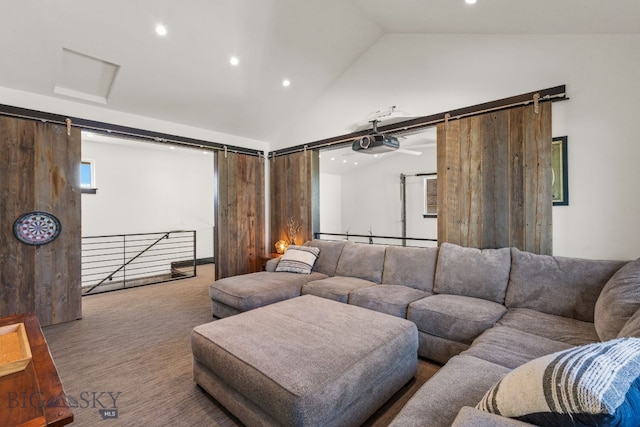 4412 Bembrick St, Bozeman, MT 59718 - living room featuring recessed lighting, carpet, a barn door, and high vaulted ceiling