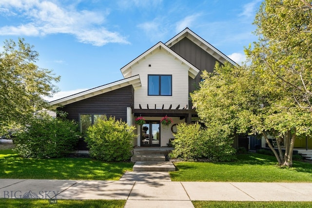 4412 Bembrick St, Bozeman, MT 59718 - view of front of home featuring board and batten siding and a front lawn