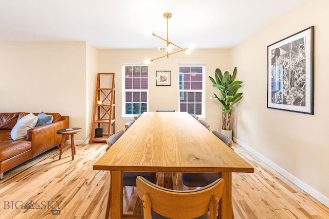 4619 Cascade St, Bozeman, MT 59718 - dining space with light wood-style flooring and a chandelier