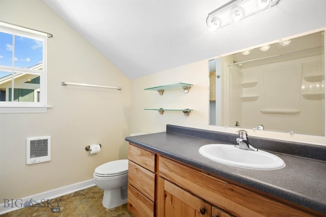 4619 Cascade St, Bozeman, MT 59718 - bathroom featuring heating unit, lofted ceiling, a shower, and vanity