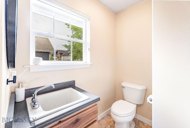4619 Cascade St, Bozeman, MT 59718 - half bathroom with vanity and tile patterned flooring