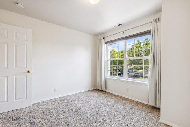 3601 Ravalli St, Bozeman, MT 59718 - carpeted spare room featuring baseboards and a smoke detector