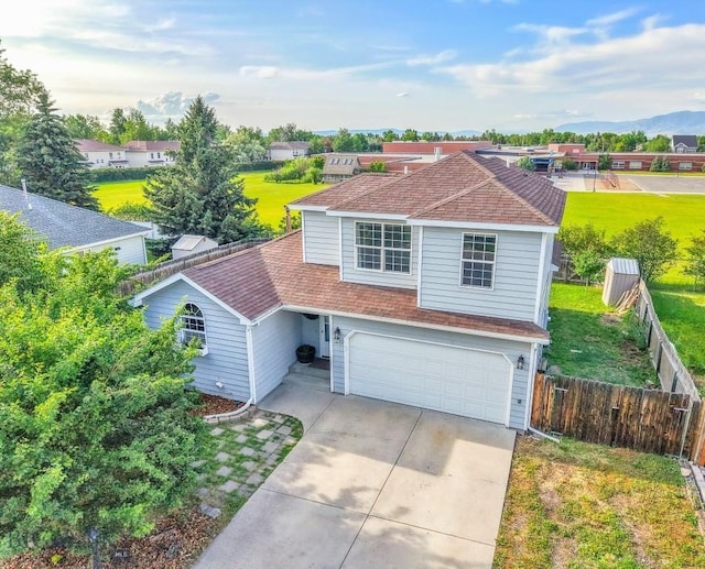 3601 Ravalli St, Bozeman, MT 59718 - traditional-style home featuring driveway, a shingled roof, and an attached garage
