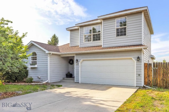 3601 Ravalli St, Bozeman, MT 59718 - traditional-style house with a garage, concrete driveway, and a shingled roof