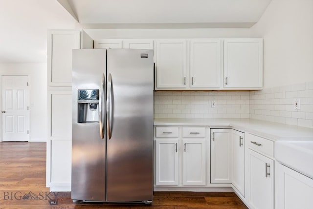 3601 Ravalli St, Bozeman, MT 59718 - kitchen featuring stainless steel fridge, white cabinetry, light countertops, and tasteful backsplash
