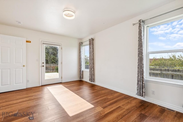 3601 Ravalli St, Bozeman, MT 59718 - empty room featuring wood finished floors and baseboards