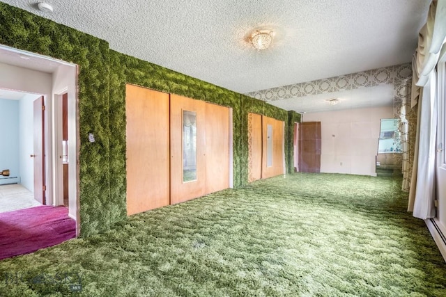 1721 S Willson Ave, Bozeman, MT 59715 - spare room featuring carpet flooring, a textured ceiling, and a smoke detector