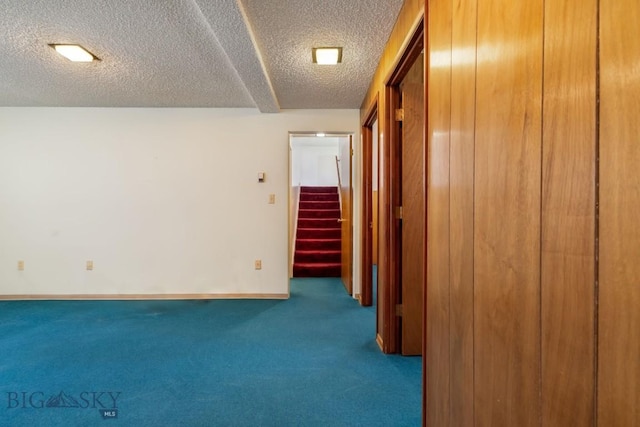 1721 S Willson Ave, Bozeman, MT 59715 - hall with carpet floors, stairs, and a textured ceiling