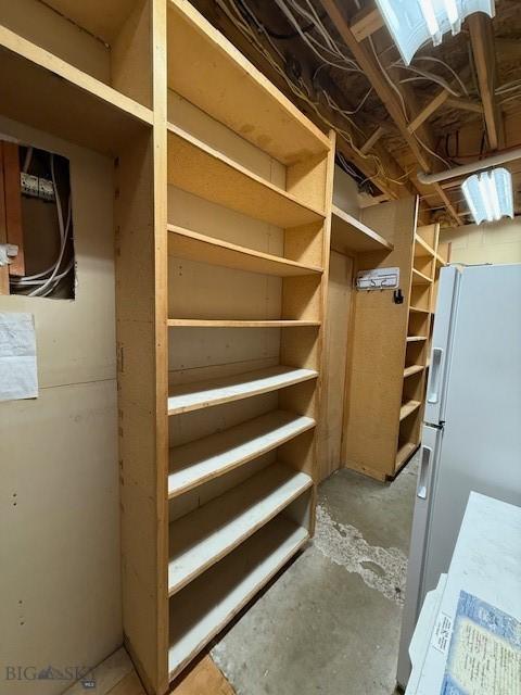 1416 W Gold St, Butte, MT 59701 - unfinished basement featuring freestanding refrigerator