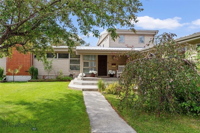 1416 W Gold St, Butte, MT 59701 - view of front of property with a front lawn, a metal roof, and covered porch