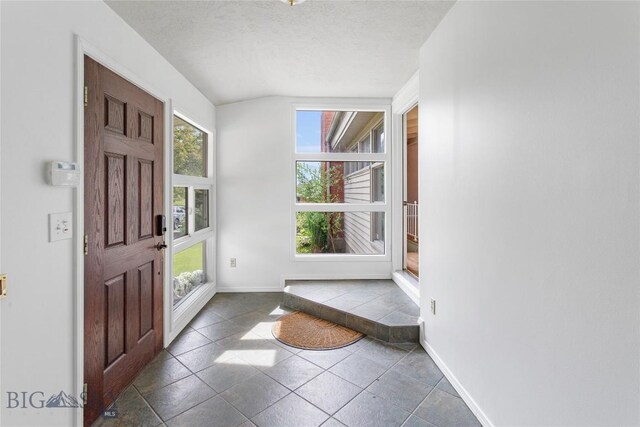 1416 W Gold St, Butte, MT 59701 - tiled foyer with plenty of natural light and a textured ceiling