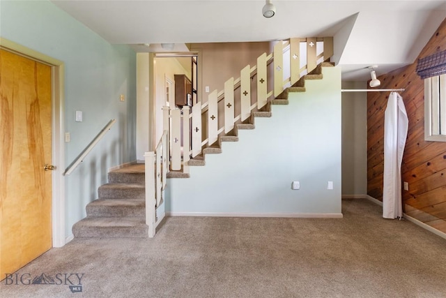 1416 W Gold St, Butte, MT 59701 - staircase with carpet flooring and wood walls