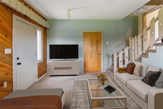 1416 W Gold St, Butte, MT 59701 - living room with carpet flooring, stairway, and wood walls