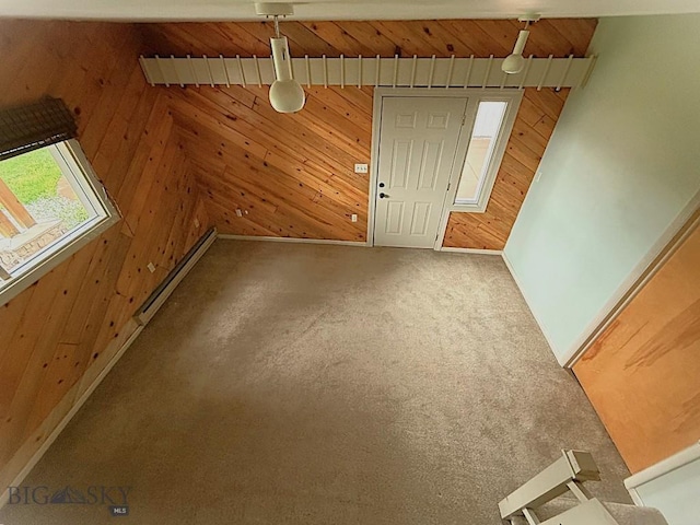 1416 W Gold St, Butte, MT 59701 - entryway featuring wood walls, a baseboard radiator, and carpet
