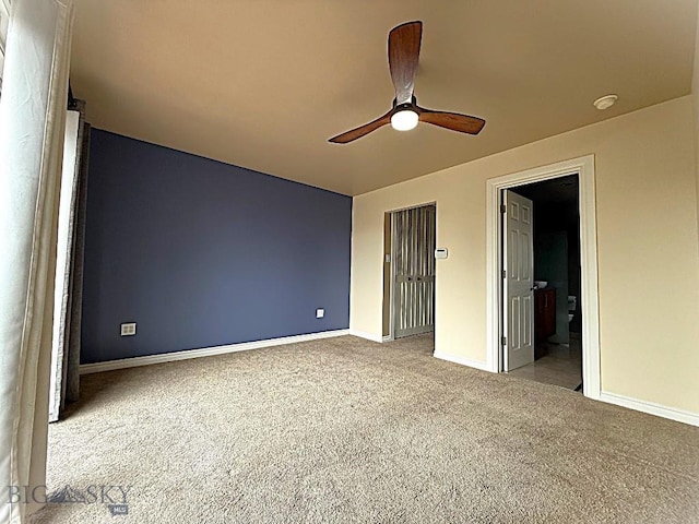 1416 W Gold St, Butte, MT 59701 - unfurnished bedroom with carpet, ceiling fan, and ensuite bath