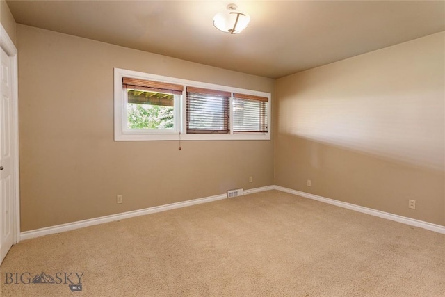 1416 W Gold St, Butte, MT 59701 - spare room featuring light carpet