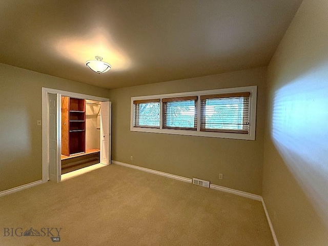 1416 W Gold St, Butte, MT 59701 - unfurnished bedroom with carpet flooring and a closet