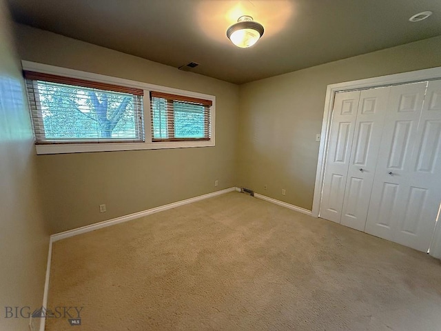 1416 W Gold St, Butte, MT 59701 - unfurnished bedroom with light carpet and a closet