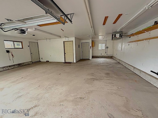 1416 W Gold St, Butte, MT 59701 - garage featuring a garage door opener and a heating unit