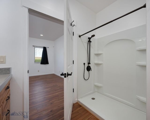 375 Price Rd, Three Forks, MT 59752 - bathroom featuring a shower, wood finished floors, and vanity