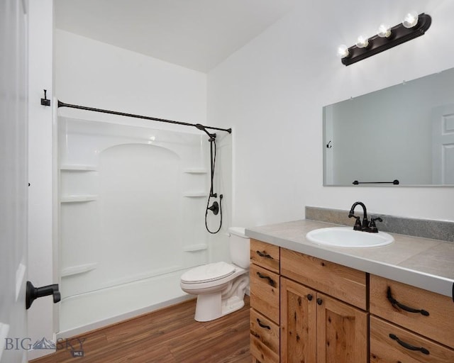 375 Price Rd, Three Forks, MT 59752 - bathroom featuring a shower, vanity, and wood finished floors