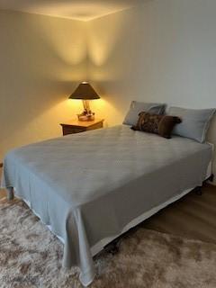 21 Sitting Bull Rd Unit 1233, Big Sky, MT 59716 - bedroom with wood finished floors
