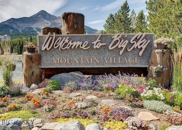 21 Sitting Bull Rd Unit 1233, Big Sky, MT 59716 - community sign featuring a mountain view