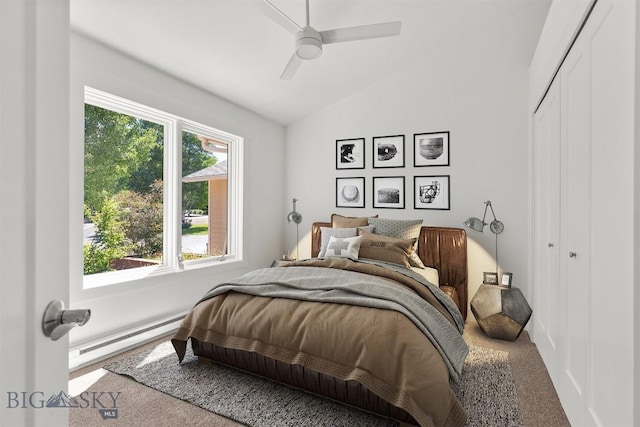 4901 Itana Cir, Bozeman, MT 59715 - bedroom with a baseboard heating unit, carpet floors, vaulted ceiling, ceiling fan, and a closet