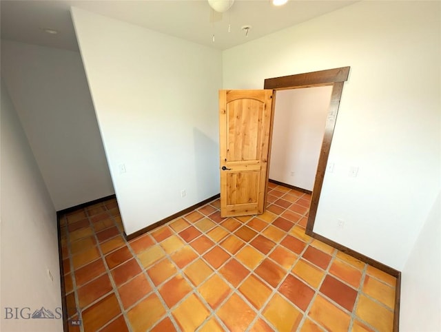 51 Highlander Dr, Three Forks, MT 59752 - spare room with baseboards and a ceiling fan