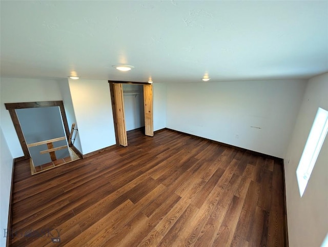 51 Highlander Dr, Three Forks, MT 59752 - unfurnished bedroom featuring dark wood-style floors and a closet