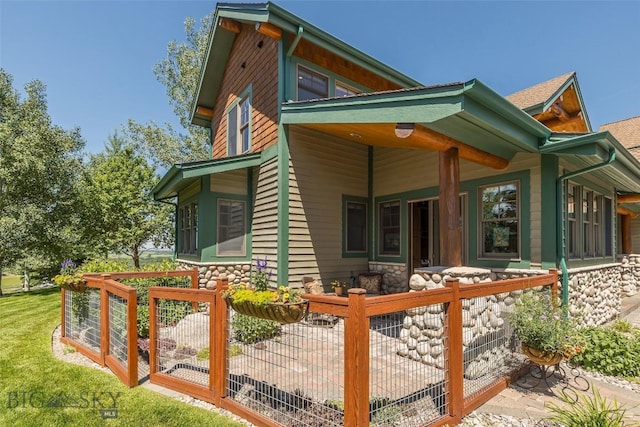 390 Hayrake Ln, Bozeman, MT 59715 - view of front of home featuring stone siding