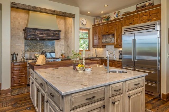 390 Hayrake Ln, Bozeman, MT 59715 - kitchen with stainless steel appliances, decorative backsplash, dark wood-style floors, and recessed lighting