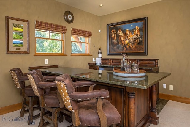 390 Hayrake Ln, Bozeman, MT 59715 - bar area with carpet floors and baseboards