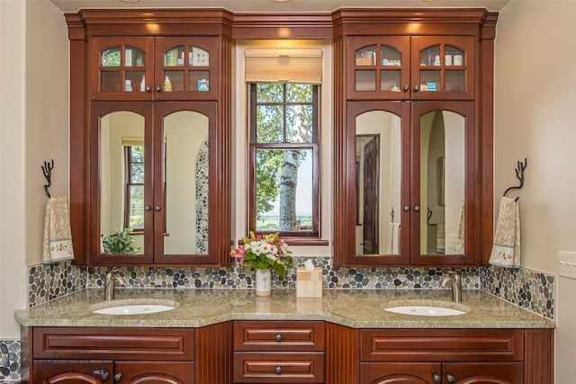 390 Hayrake Ln, Bozeman, MT 59715 - full bath with double vanity, backsplash, and french doors