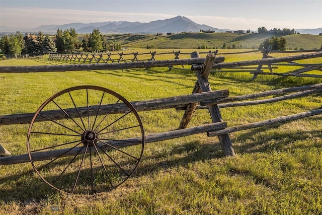 390 Hayrake Ln, Bozeman, MT 59715 - view of mountain backdrop with rural landscape and a pastoral area