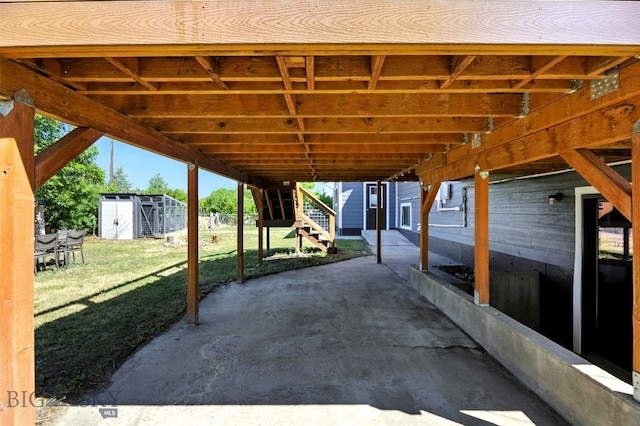 801 Iowa St, Belgrade, MT 59714 - view of patio with a storage unit and stairs