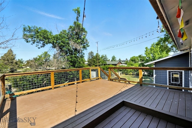 801 Iowa St, Belgrade, MT 59714 - view of wooden deck