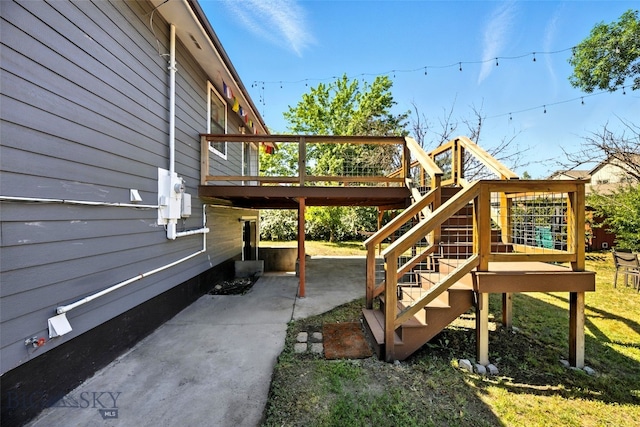 801 Iowa St, Belgrade, MT 59714 - view of patio / terrace featuring a wooden deck and stairs