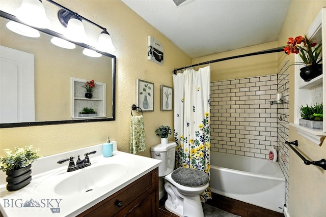 801 Iowa St, Belgrade, MT 59714 - bathroom featuring vanity, shower / bathtub combination with curtain, and a textured wall
