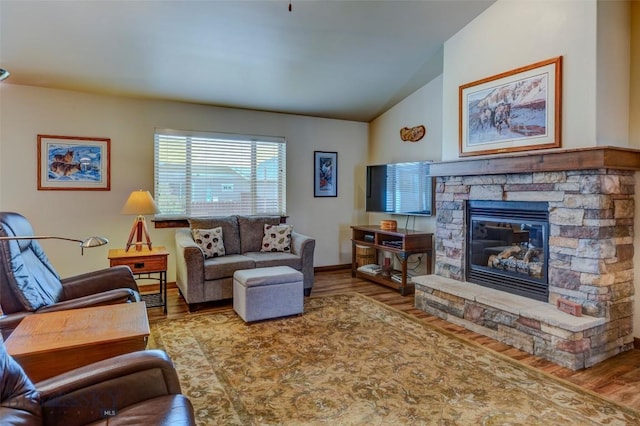 9848 Durston Rd Unit A, Bozeman, MT 59718 - living room with lofted ceiling, wood finished floors, and a fireplace