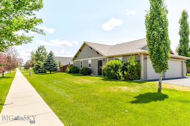 9848 Durston Rd Unit A, Bozeman, MT 59718 - view of side of property with driveway, a garage, and roof with shingles