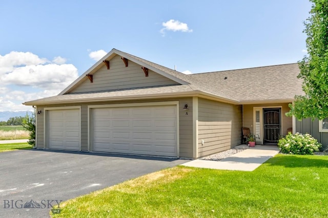 9848 Durston Rd Unit A, Bozeman, MT 59718 - single story home with driveway, roof with shingles, a garage, and a front yard