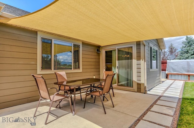 9848 Durston Rd Unit A, Bozeman, MT 59718 - view of patio featuring outdoor dining area